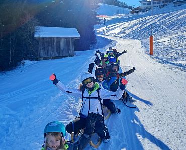 2024_Kufstein_Ferienexpress Weihnachten_Rodeln in Söll_c Vielfalt GmbH